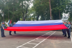 Сотрудники и ветераны УФСИН России по Омской области приняли участие в мероприятиях, посвященных Дню Государственного флага Российской Федерации
