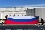 Сотрудники и ветераны УФСИН России по Омской области приняли участие в мероприятиях, посвященных Дню Государственного флага Российской Федерации