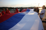 Омичи проехали ночной велопробег в честь Дня флага России