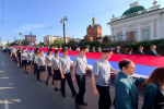 Личный состав УФСИН России по Омской области принял участие в развертывании 55-метрового Государственного флага Российской Федерации